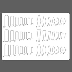 Stencil with various geometric shapes and measurements on a gray background