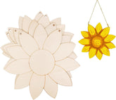 Wooden sunflower template and yellow plastic sunflower decoration on a white background