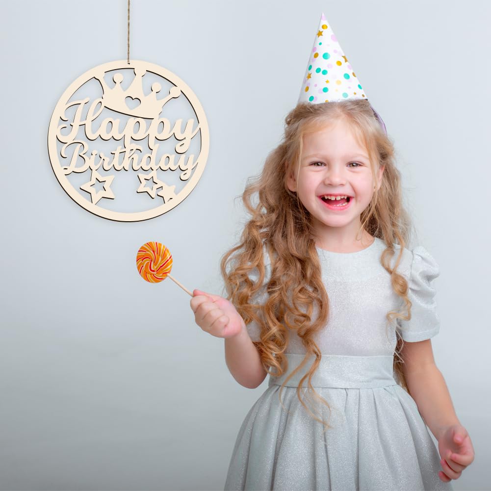Child wearing a party hat with a 'Happy Birthday' decoration and a lollipop.