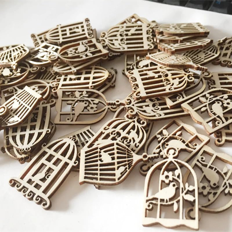 Wooden birdcage ornaments on a white surface