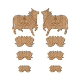 Set of decorative wooden pieces with bull and lotus designs on a white background