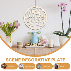 Decorative plate with 'Happy Birthday' text on a table with flowers and candles.