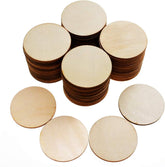 Stacks of round wooden discs on a white background