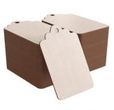 Stack of brown cardboard boxes with a single beige tag on a white background