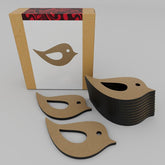 Cardboard bird-shaped cutouts with a box featuring similar designs on a white background