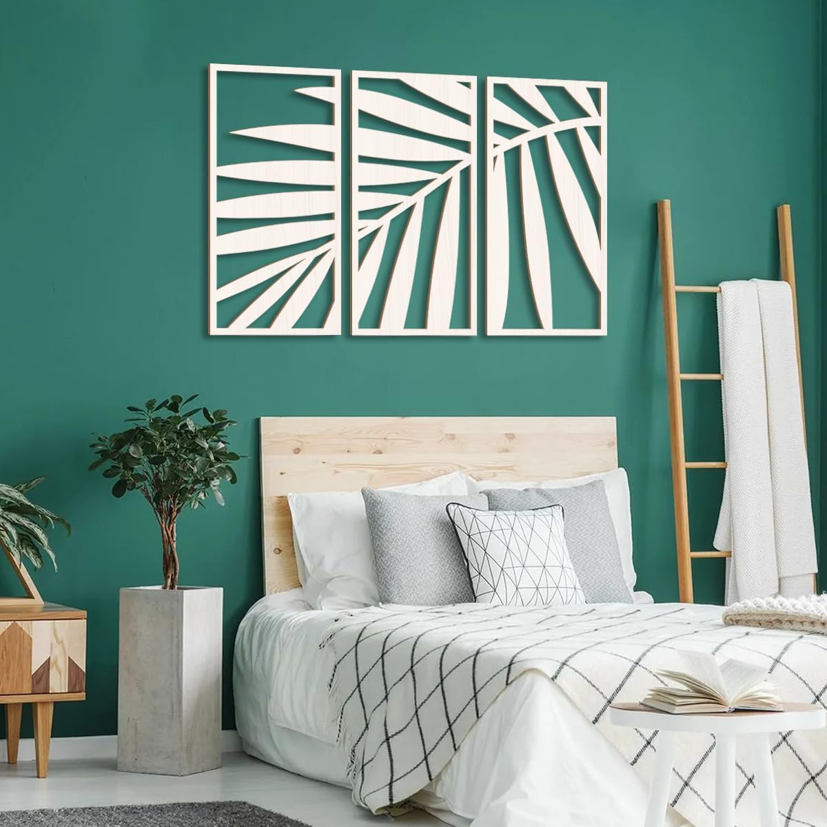 Modern bedroom with green wall, bed, and decorative elements