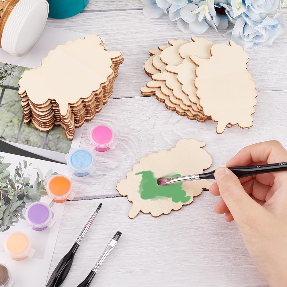 Wooden brain-shaped cutouts with paint and brushes on a table