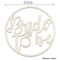 Circular wooden sign with 'Bride to be' text and measurements on a white background