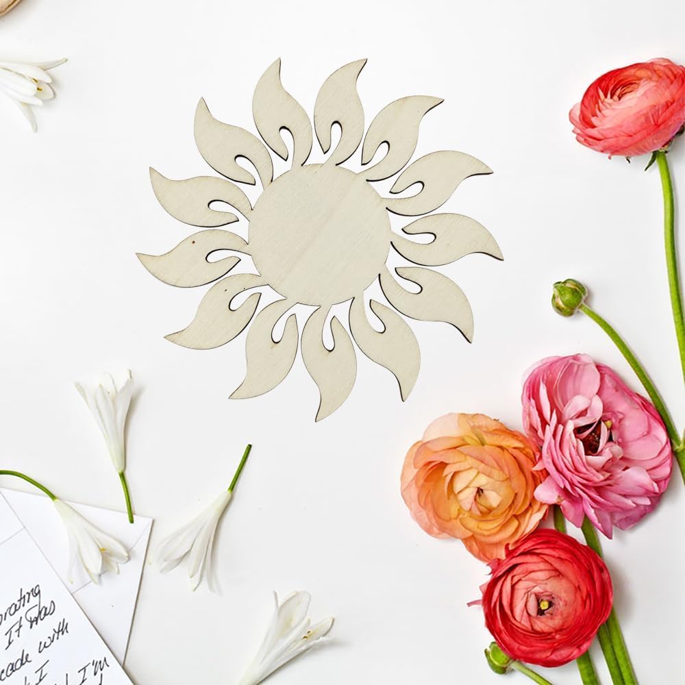 Decorative sun-shaped mirror with flowers on a white background