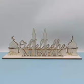 Decorative sign with 'Eid al-Adha Mubarak' text on a plain background