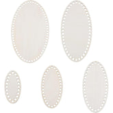 Set of five oval-shaped white plastic frames with cut-out patterns on a white background