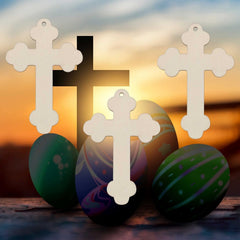 Decorative crosses and Easter eggs with a sunset background