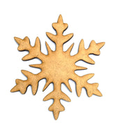 Wooden snowflake cutout on a white background