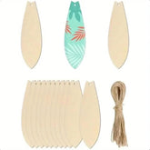 Set of wooden fish-shaped decorations with a central decorative fish and twine on a white background