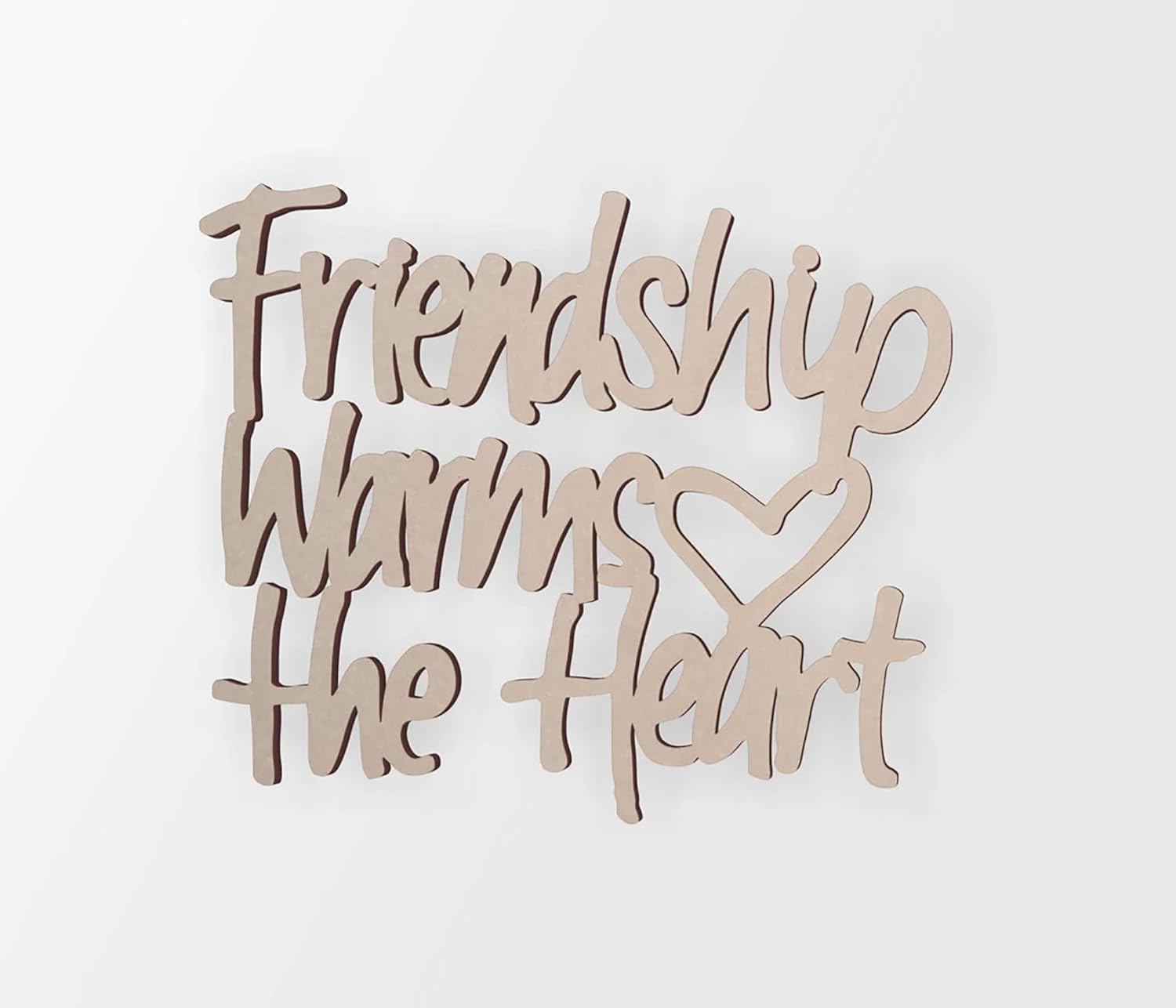 Wooden decorative sign with 'Friendship warms the heart' text on a white background
