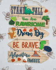 Decorative sign with motivational phrases and dinosaur illustrations on a light background.