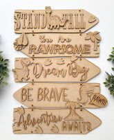 Set of wooden signs with motivational phrases and dinosaur illustrations on a white background.