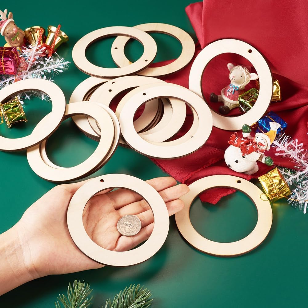 Wooden rings on a green and red background with Christmas decorations.