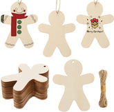 Set of wooden gingerbread man ornaments with decorative elements on a white background