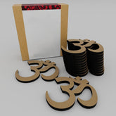 Cardboard 'Om' symbols with a stack and a box on a white background