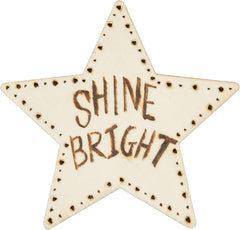 Star-shaped ornament with 'Shine Bright' text on a white background
