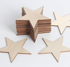 Stack of wooden star shapes on a white background