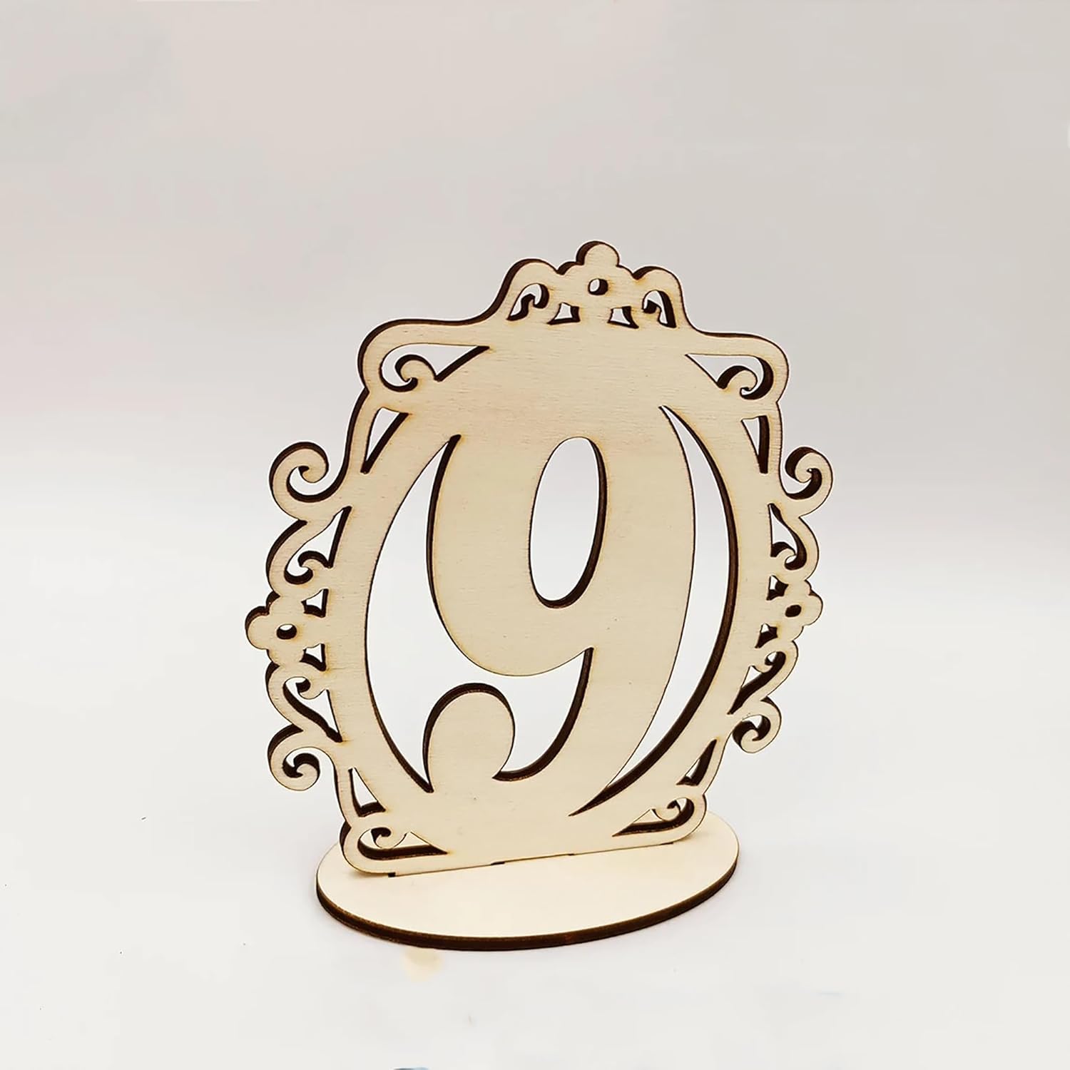 Wooden table number '9' with decorative frame on a white background