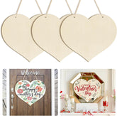 Heart-shaped wooden signs with decorative messages on a white background