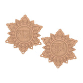 Pair of brown decorative earrings with intricate designs on a white background