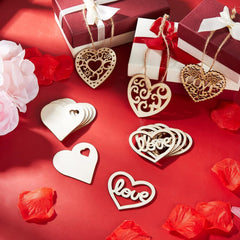 Decorative wooden hearts with 'love' on a red background with gift boxes and flowers.