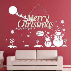 Decorative Christmas wall decal with 'Merry Christmas' and snowmen on a red wall above a beige sofa.