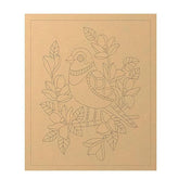 Cardboard cutout of a bird and floral design on a brown background