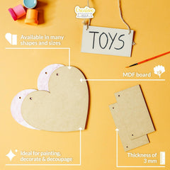 Heart-shaped MDF board with paint cans, a brush, and text on a yellow background