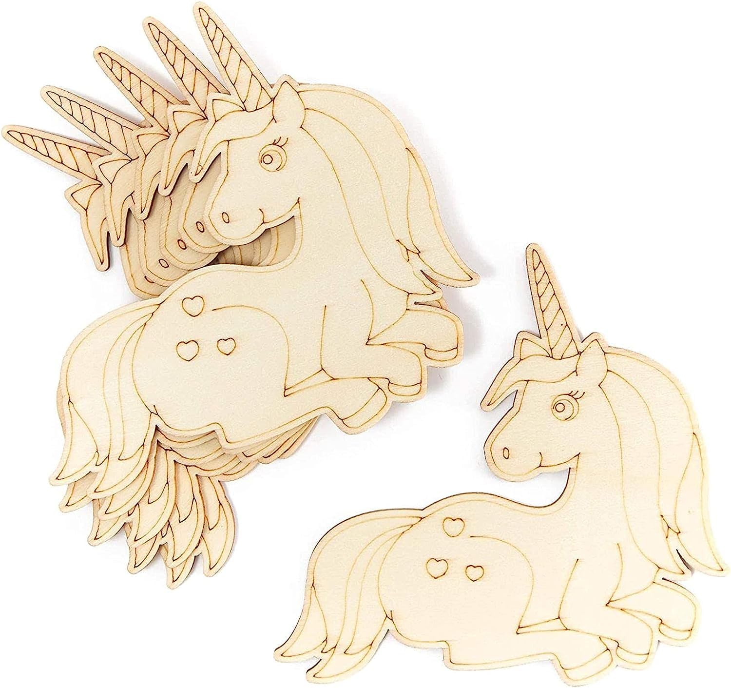 Three wooden unicorn figurines on a white background