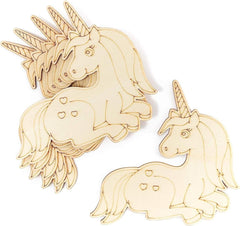 Three wooden unicorn figurines on a white background
