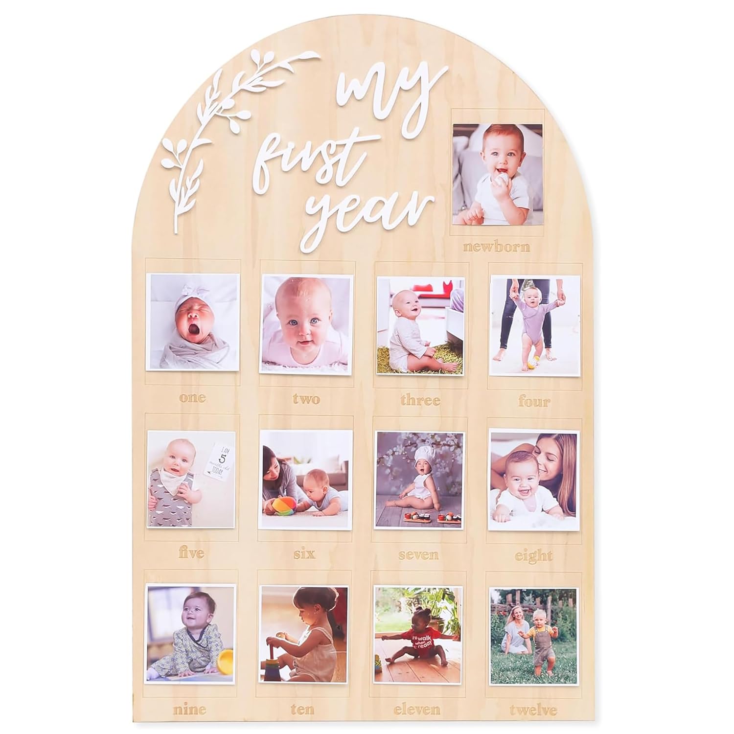 Wooden photo display with 'my first year' text and baby photos.