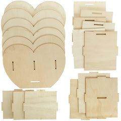 Collection of wooden heart shapes and other cutouts on a white background