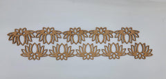 Row of decorative wooden lotus flower shapes on a white background