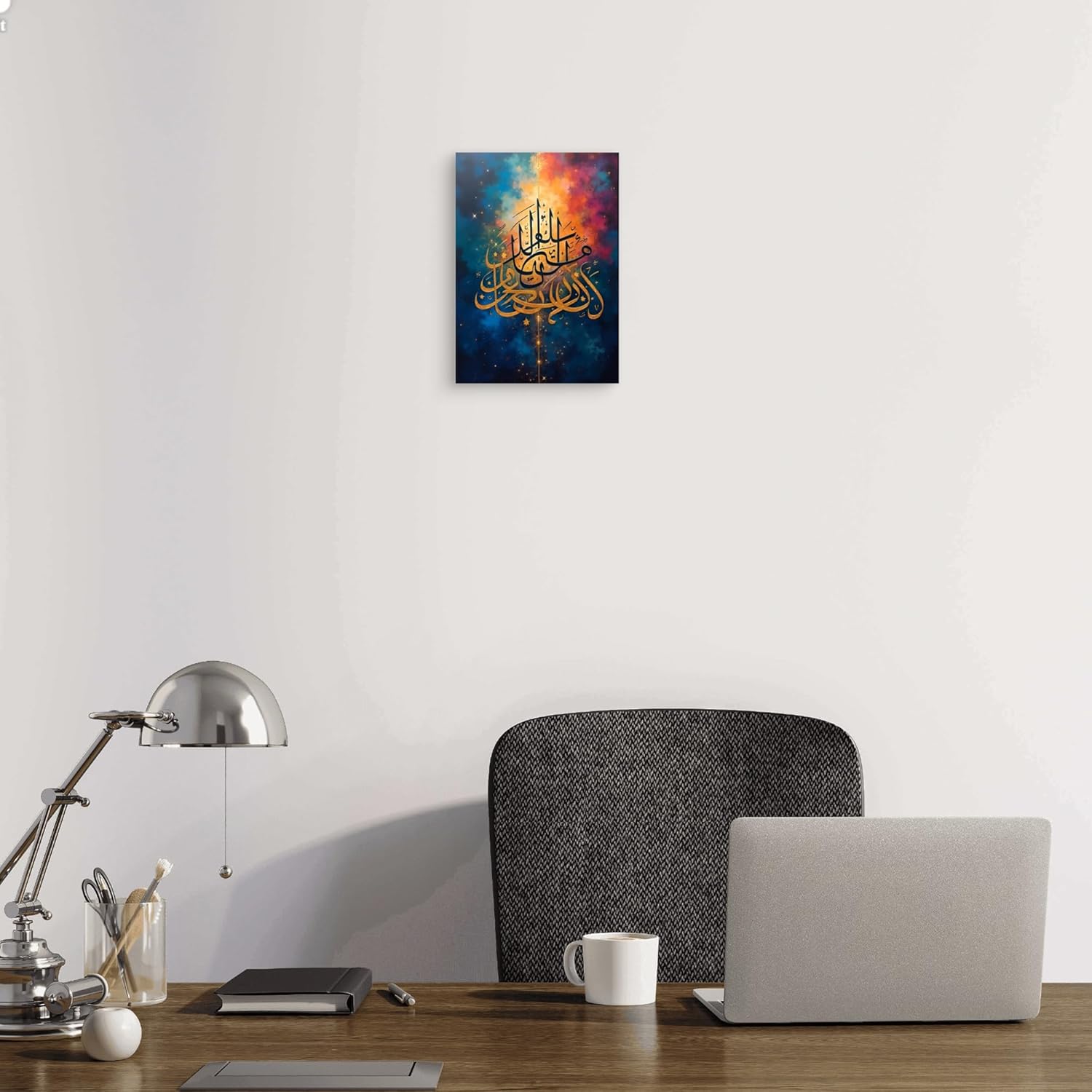 Decorative wall art with Arabic calligraphy above a desk setup.