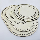 Set of circular metal gaskets with holes on a white background