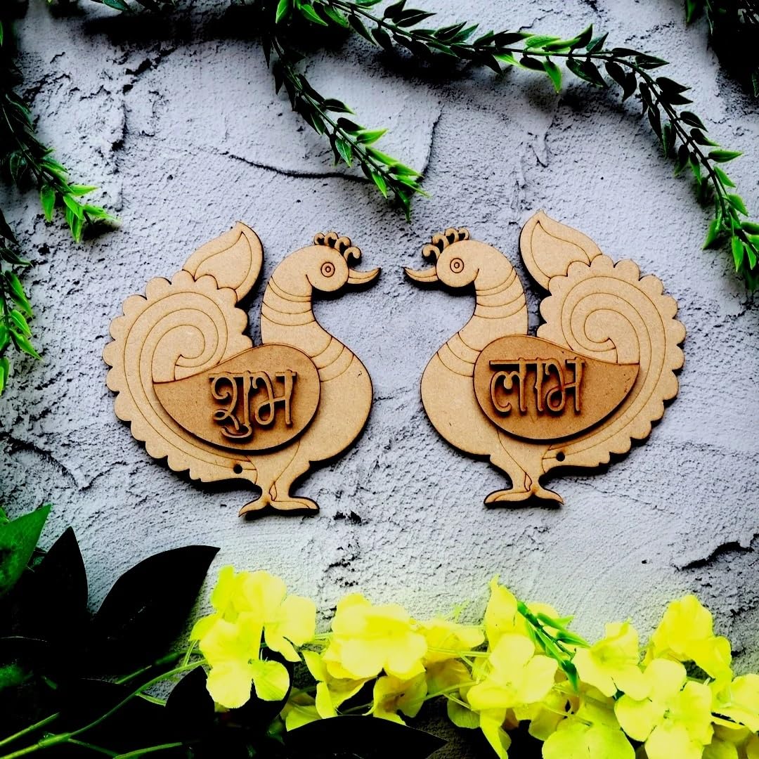 Two wooden bird-shaped decorations with engraved text on a textured surface with greenery and flowers.
