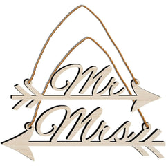 Wooden sign with 'Mr' and 'Mrs' text on a white background