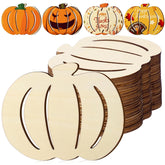 Wooden pumpkin shapes with various designs on a white background