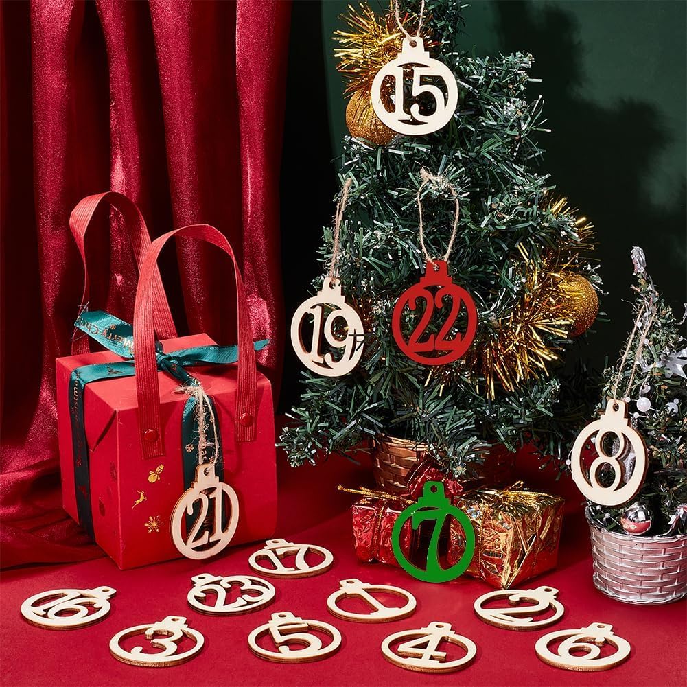 Advent calendar with numbered wooden ornaments on a red surface and Christmas tree.