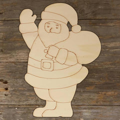 Wooden cutout of a Santa Claus figure on a wooden background