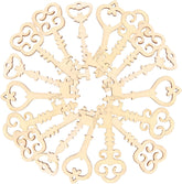 Decorative wooden keys with intricate designs on a white background