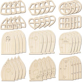Collection of wooden fairy doors with various designs on a white background