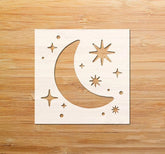Wooden moon and star cutout on a wooden surface