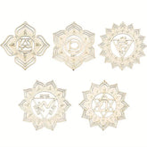 Five white chakra symbols on a white background