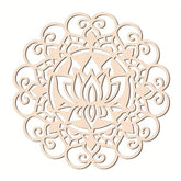 Decorative wooden cutout with intricate patterns on a white background